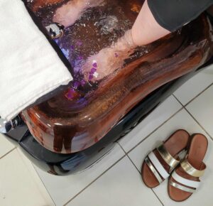 Self care of feet in spa bath