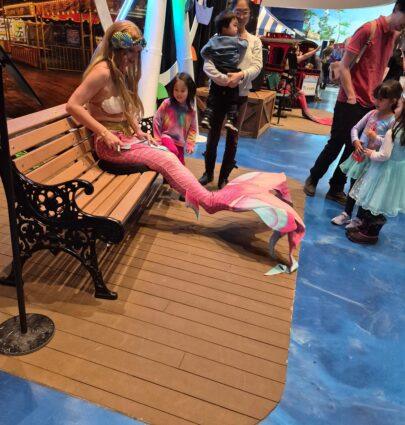 mermaid sitting