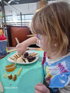 enjoying birthday dessert