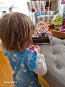 Daughter with unicorn cake