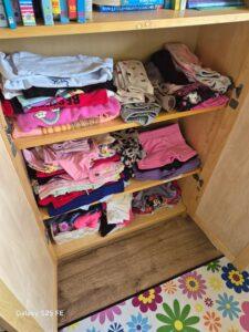 daughter's cupboard of clothing