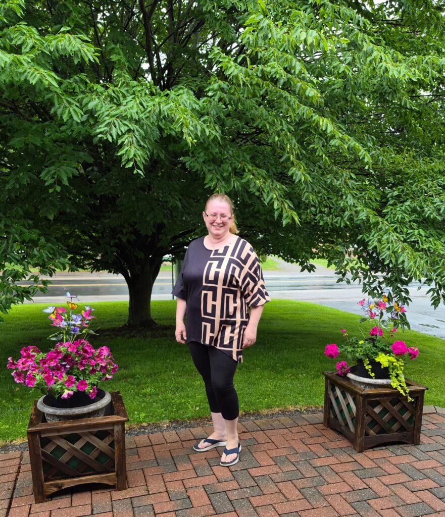 black and hashed beige top