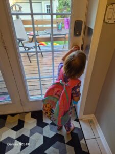 daughter with backpack